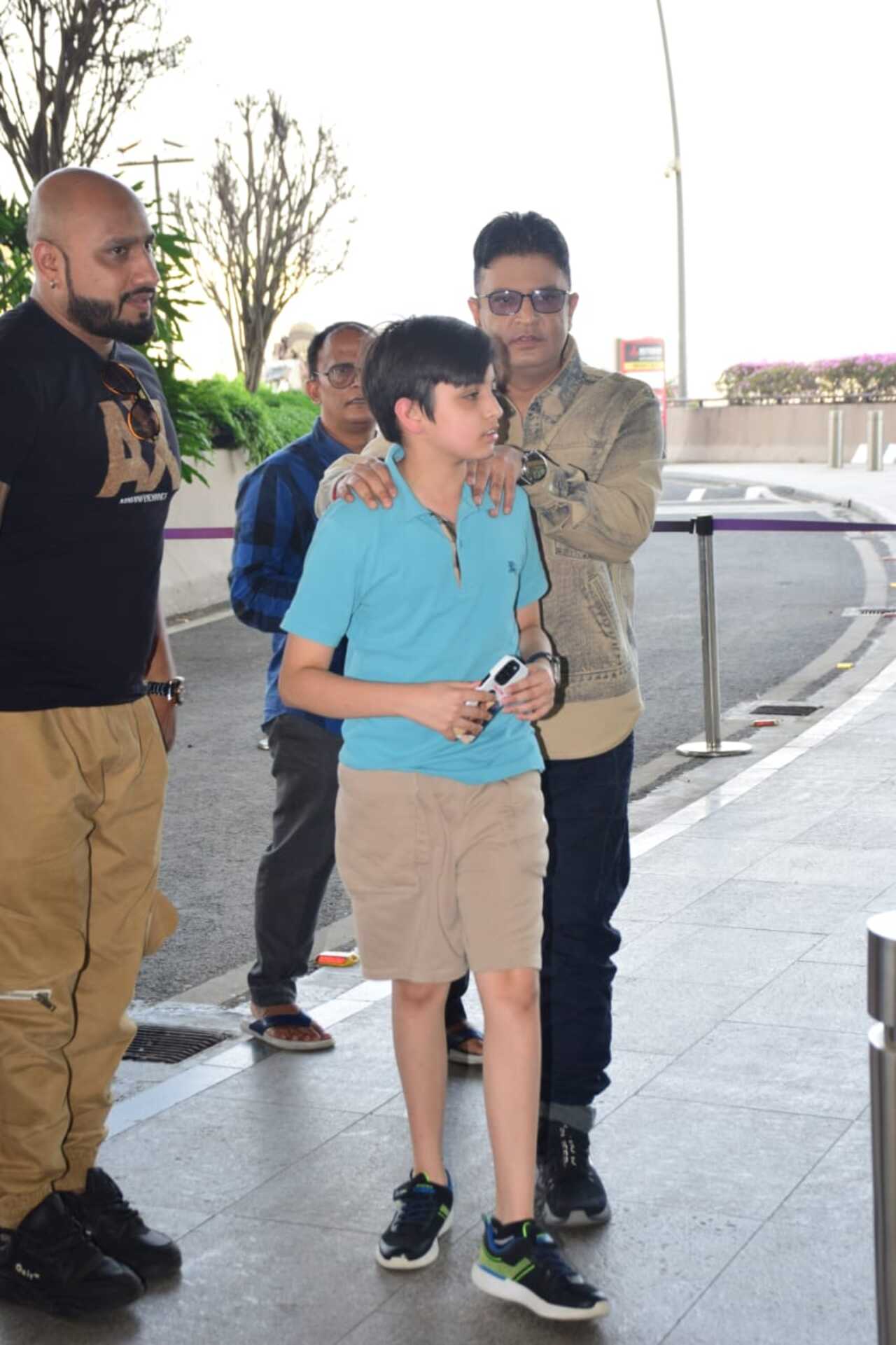 Bhushan Kumar along with his son at the airport